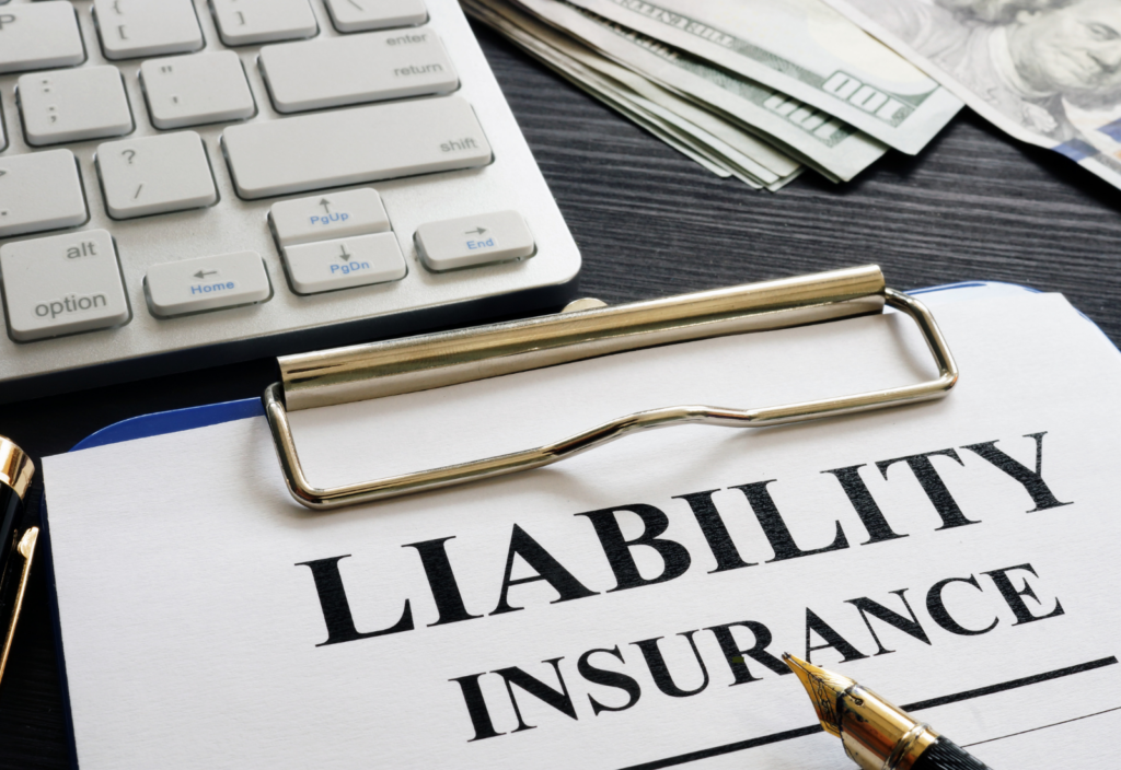 Image of a document on a clipboard reading Liability Insurance