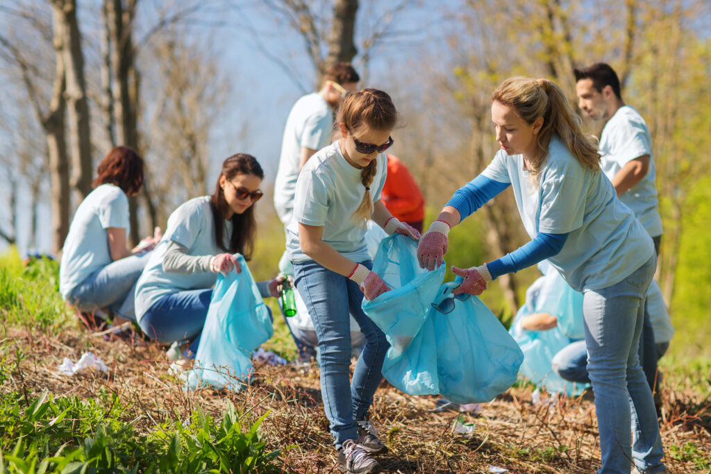 Image of volunteers picking up trash together